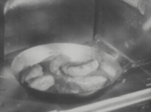 Sam cooks up some food for Claff and himself