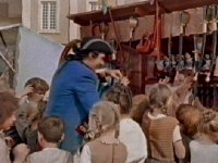 The soldier generously buys toys for the town's children