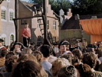 The crowd awaits the arrival of the soldier